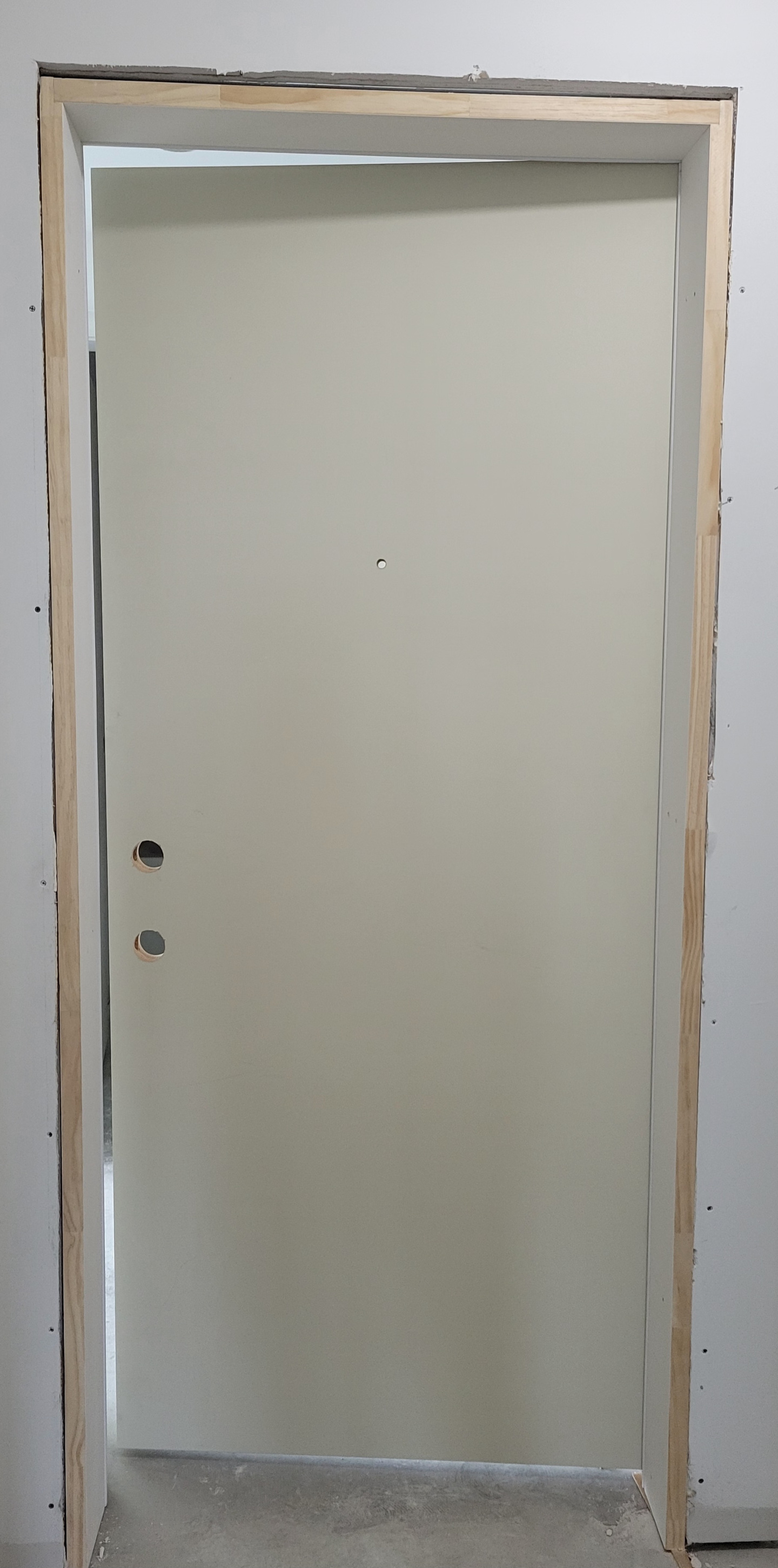 An installed doorway and door.