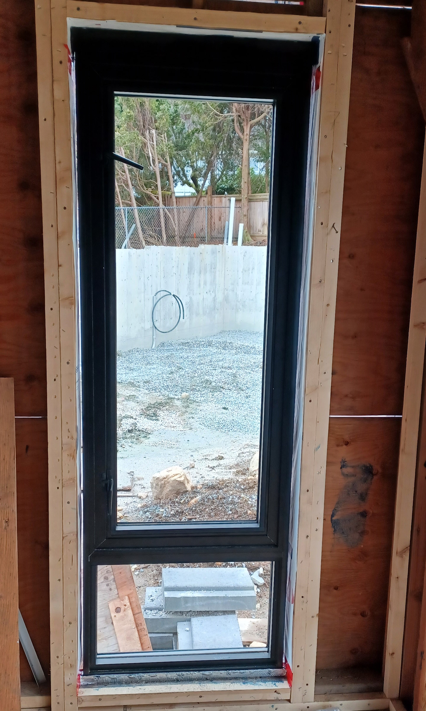 An installed sliding house window.