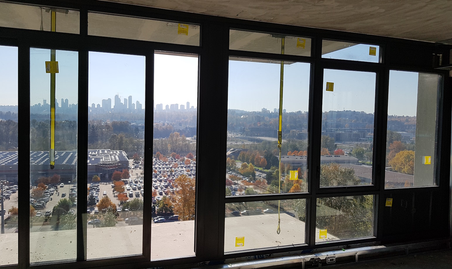 Recently-installed apartment window walls.