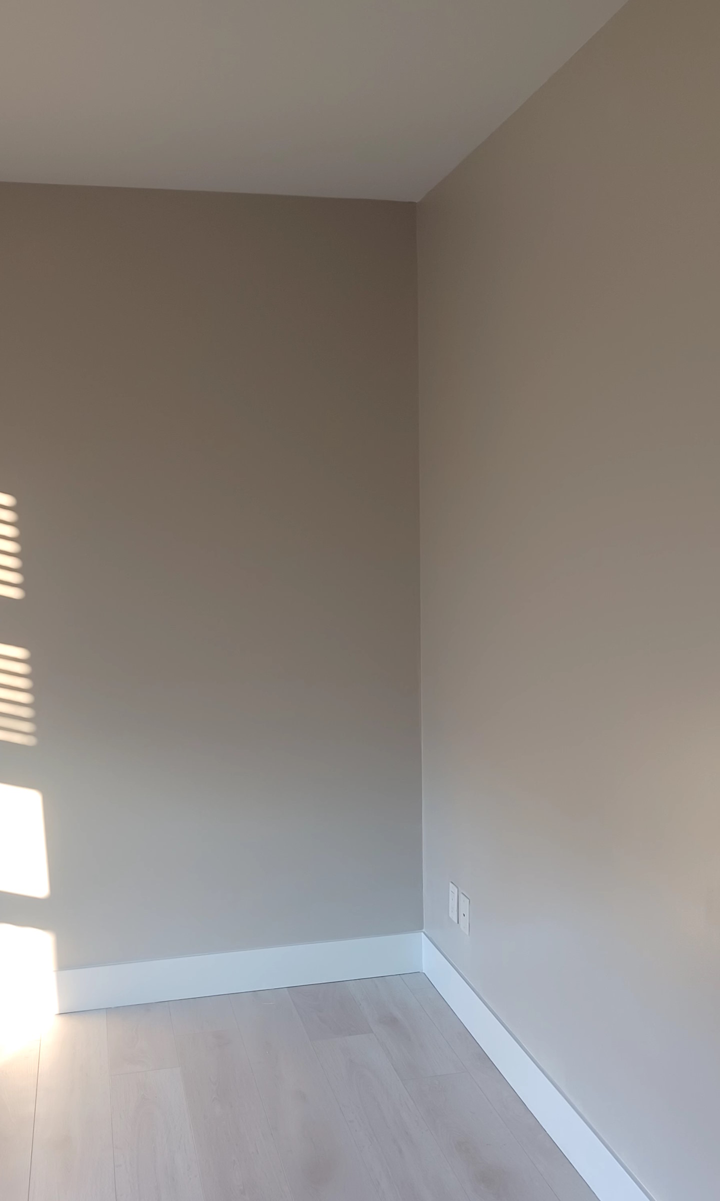 A closeup on painted wall corner.