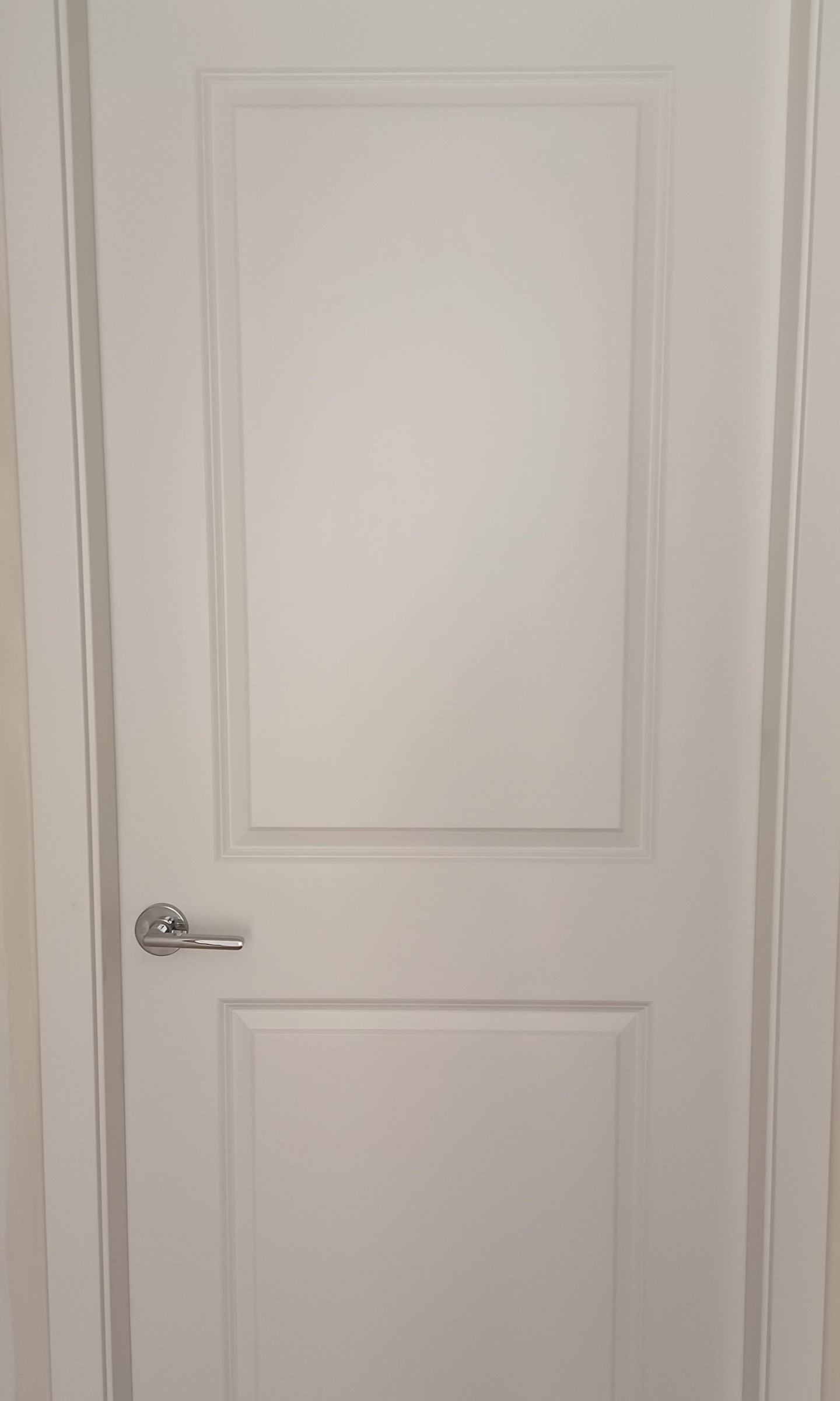 A newly-installed room door.