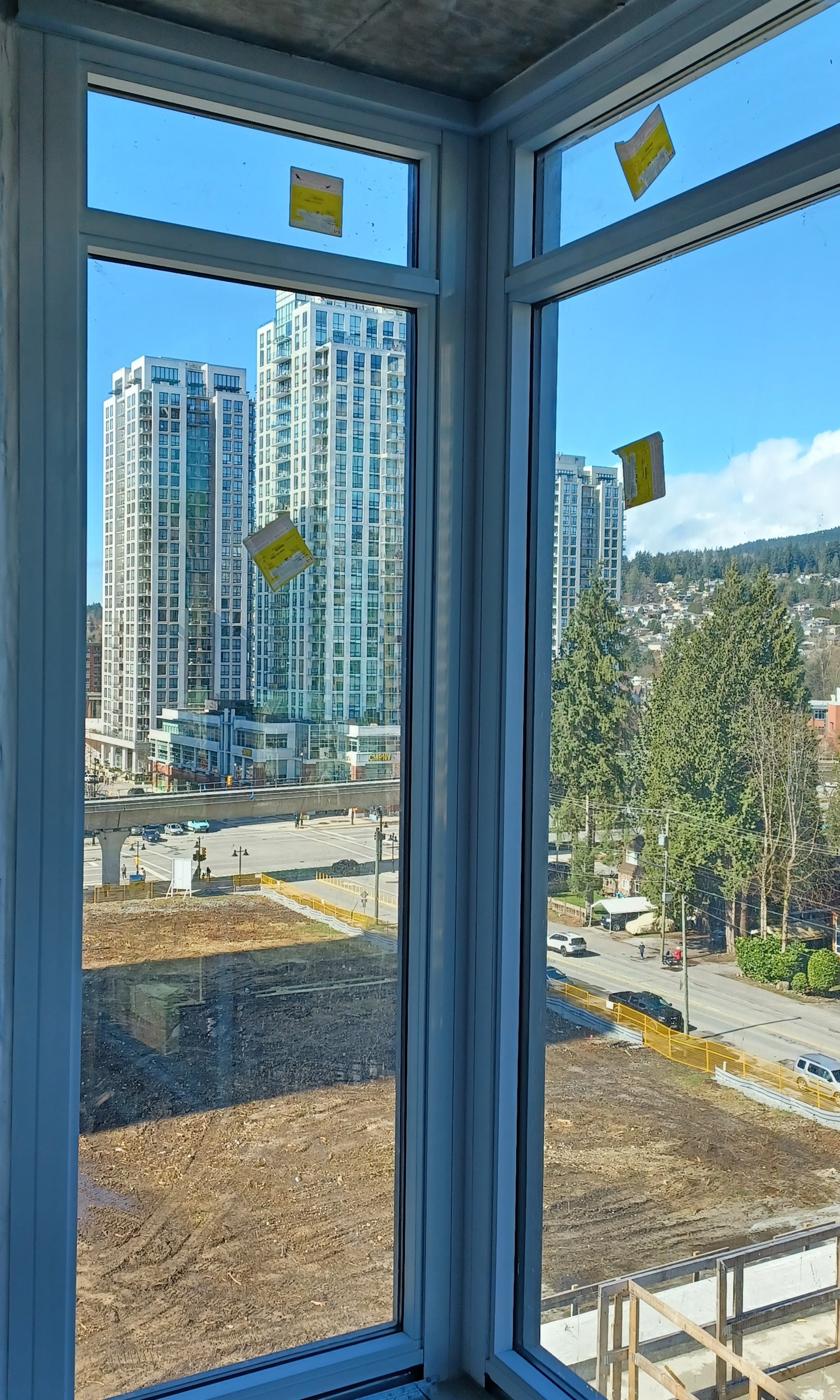 A large newly-installed multi-part corner window.