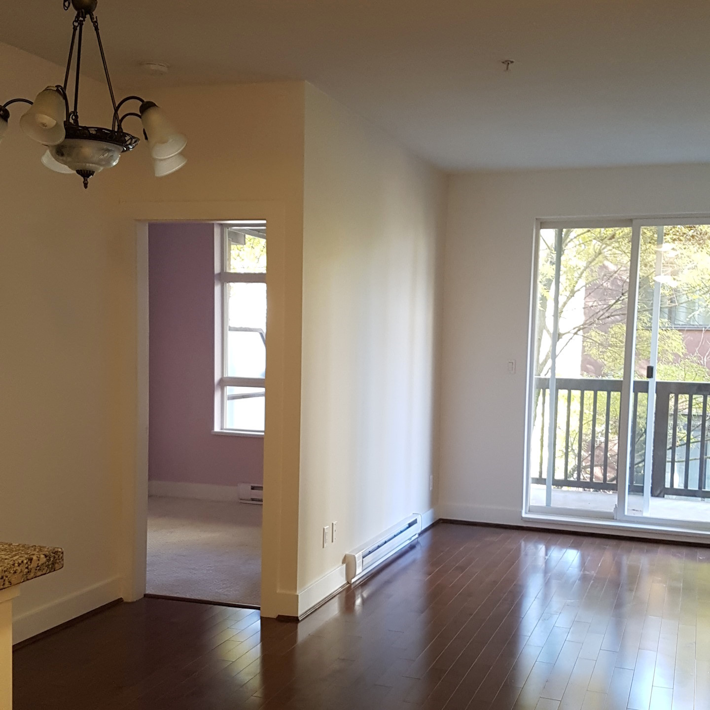 A renovated living room, with newly-painted walls.
