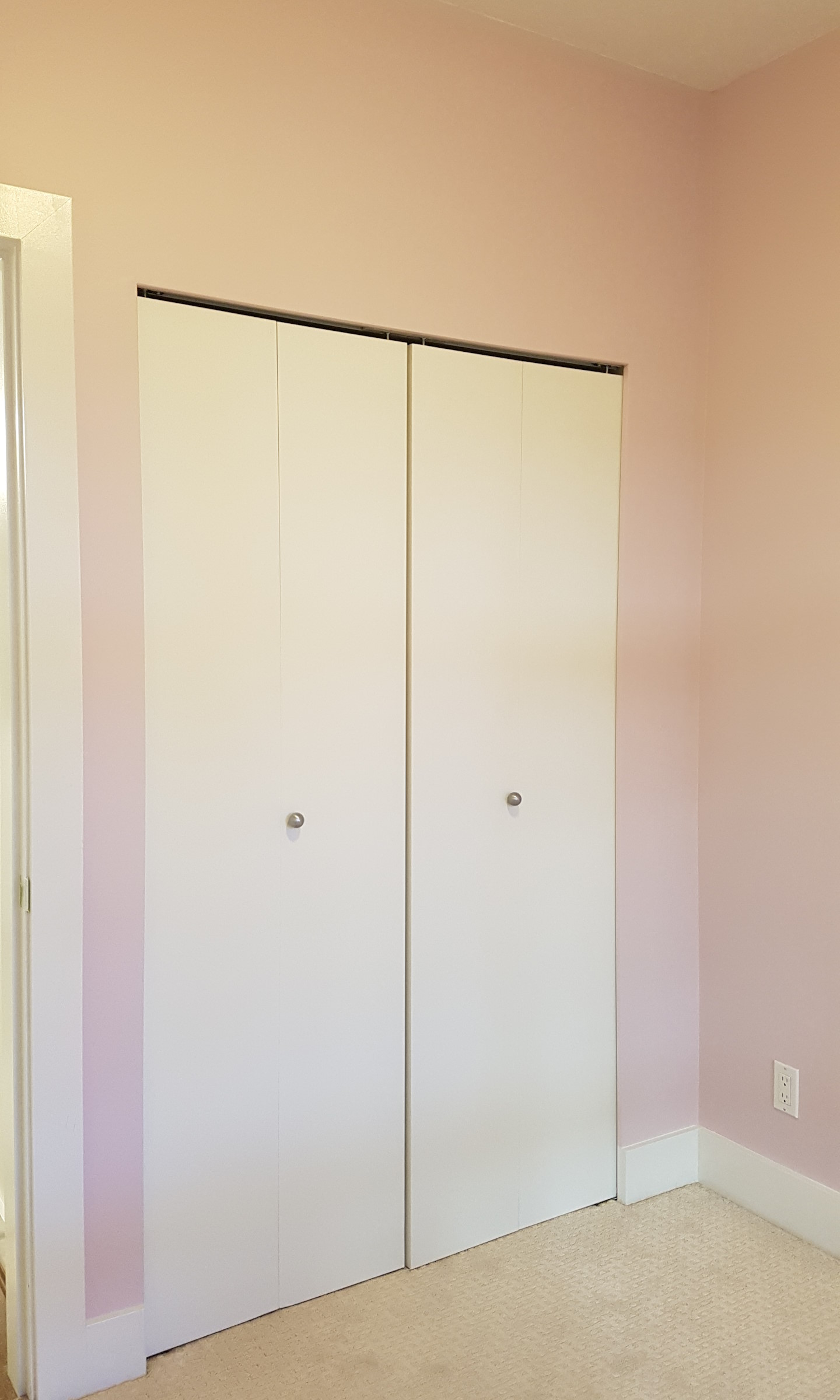 Newly-painted bedroom walls and closet.