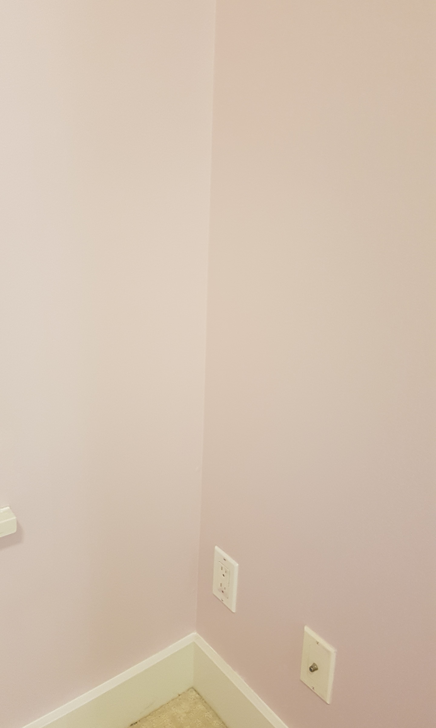 A closeup of recently-painted corner walls.
