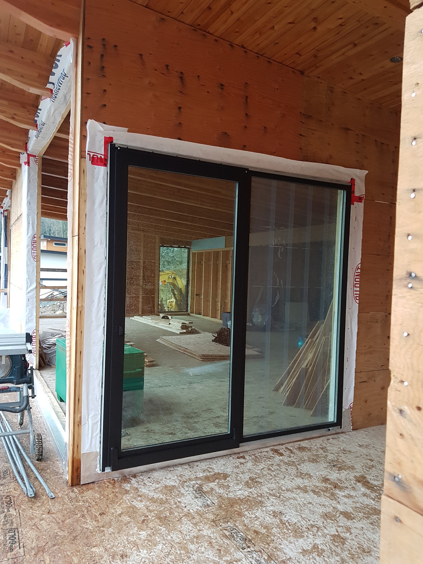 An installed glass sliding door.