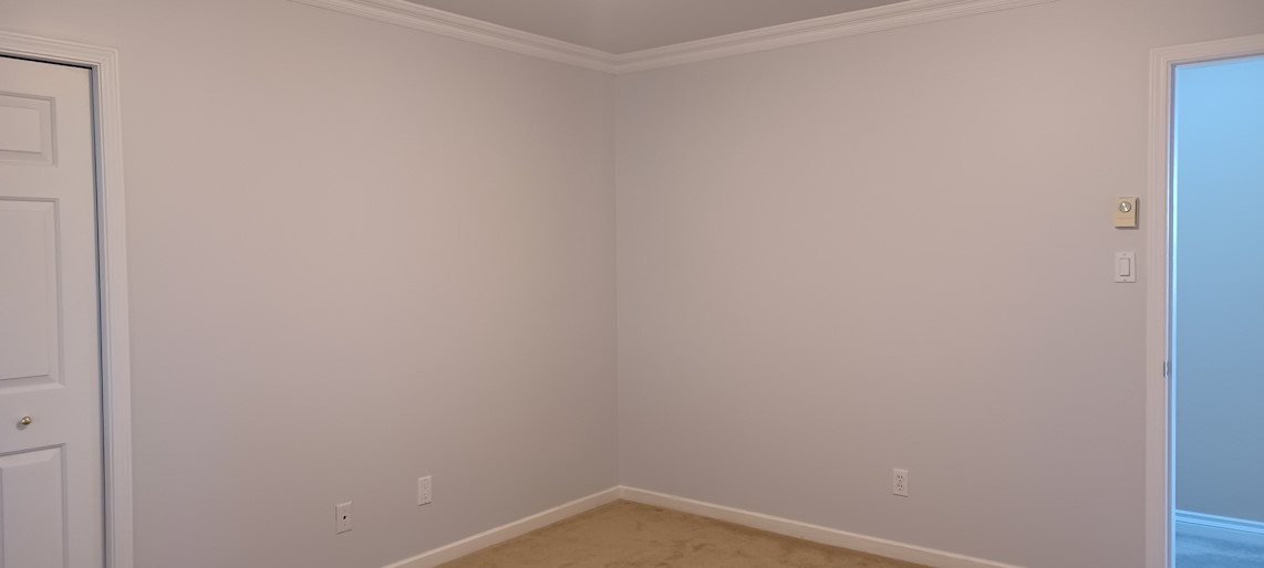 A pair of painted bedroom walls.