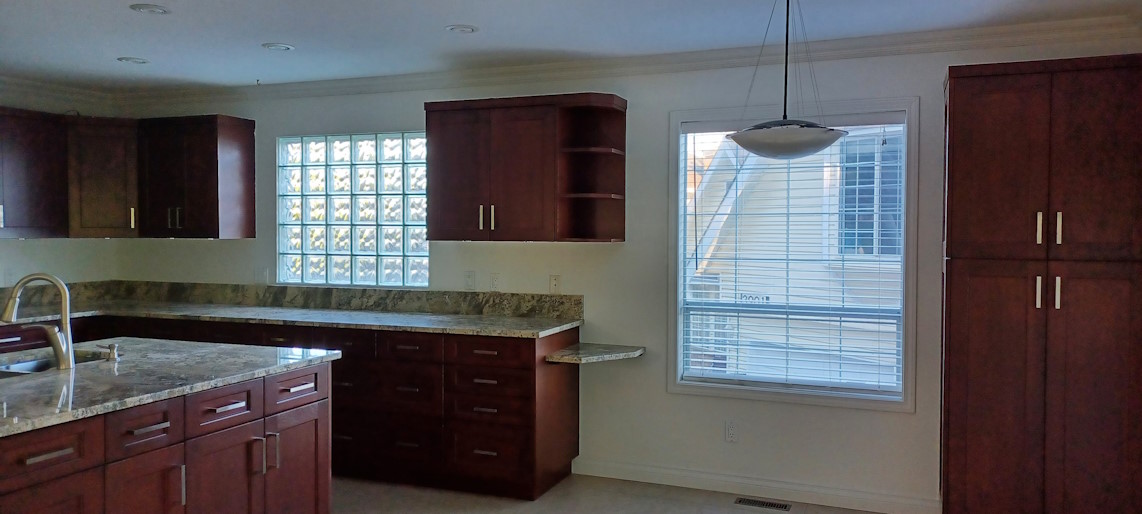 Completed kitchen renovation, with newly-painted walls.
