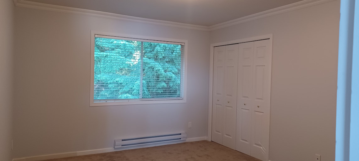 A renovated bedroom, with painted walls.