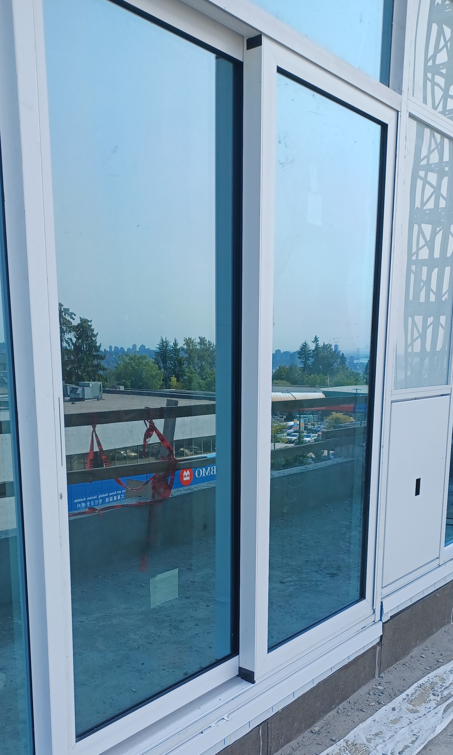 Finished result of a sliding glass wall installation.