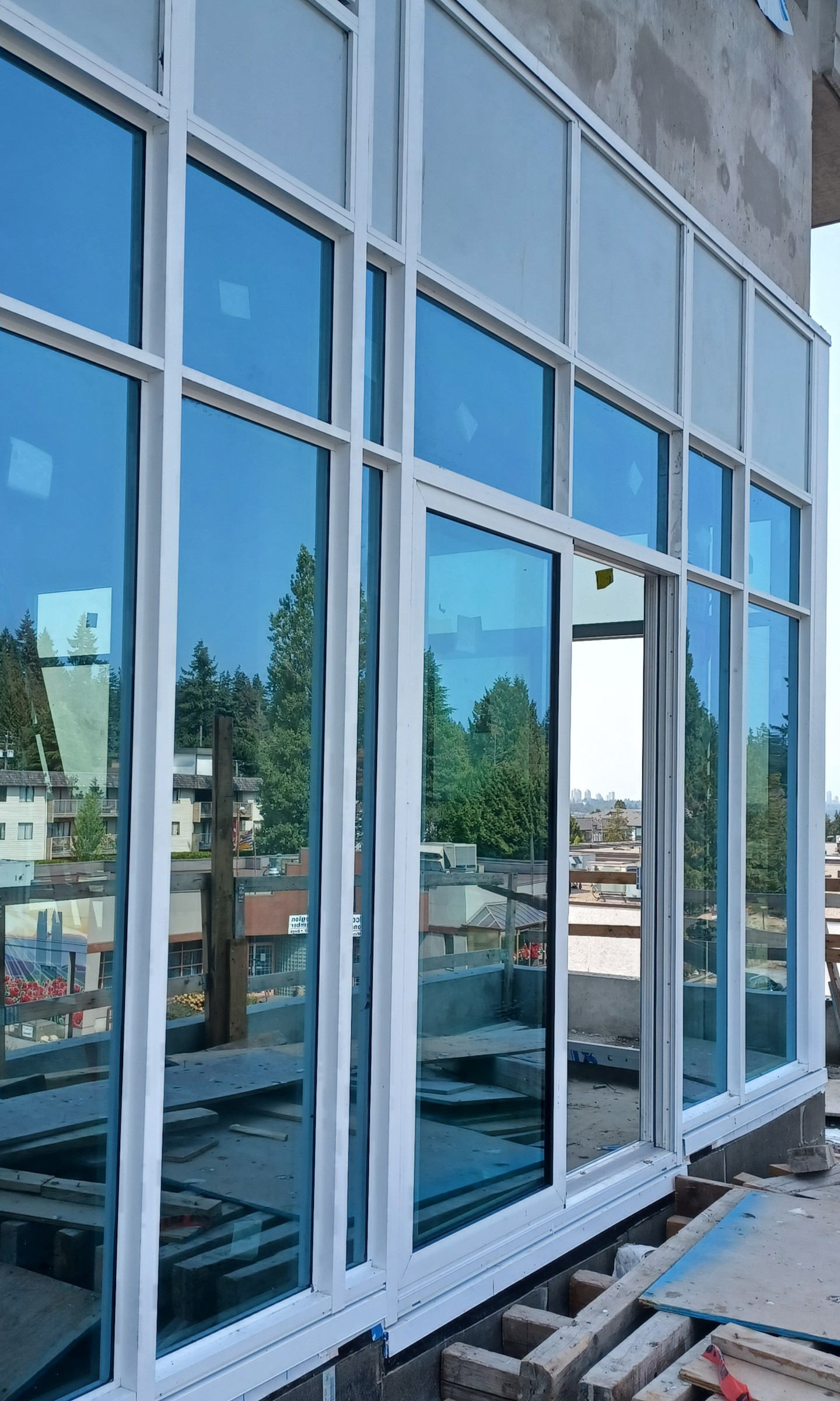 Completed sliding glass wall installation.