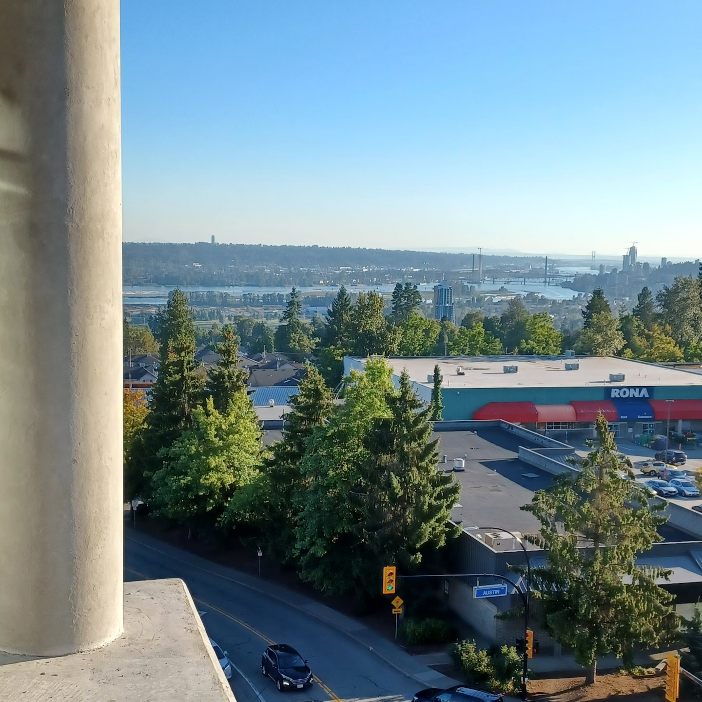 A view of terrain from an apartment building where new windows were installed.